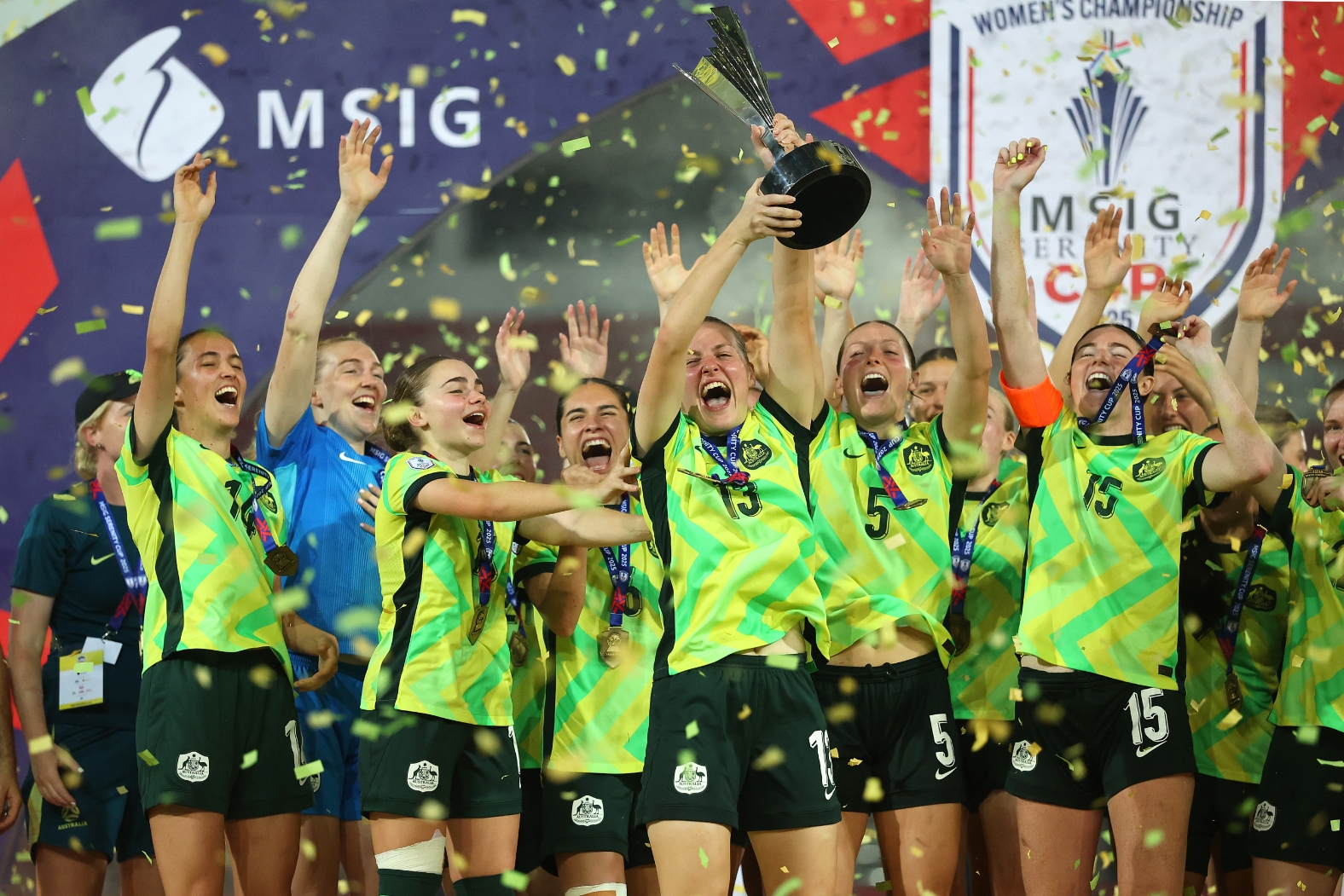 big image with players sitting and celebrating